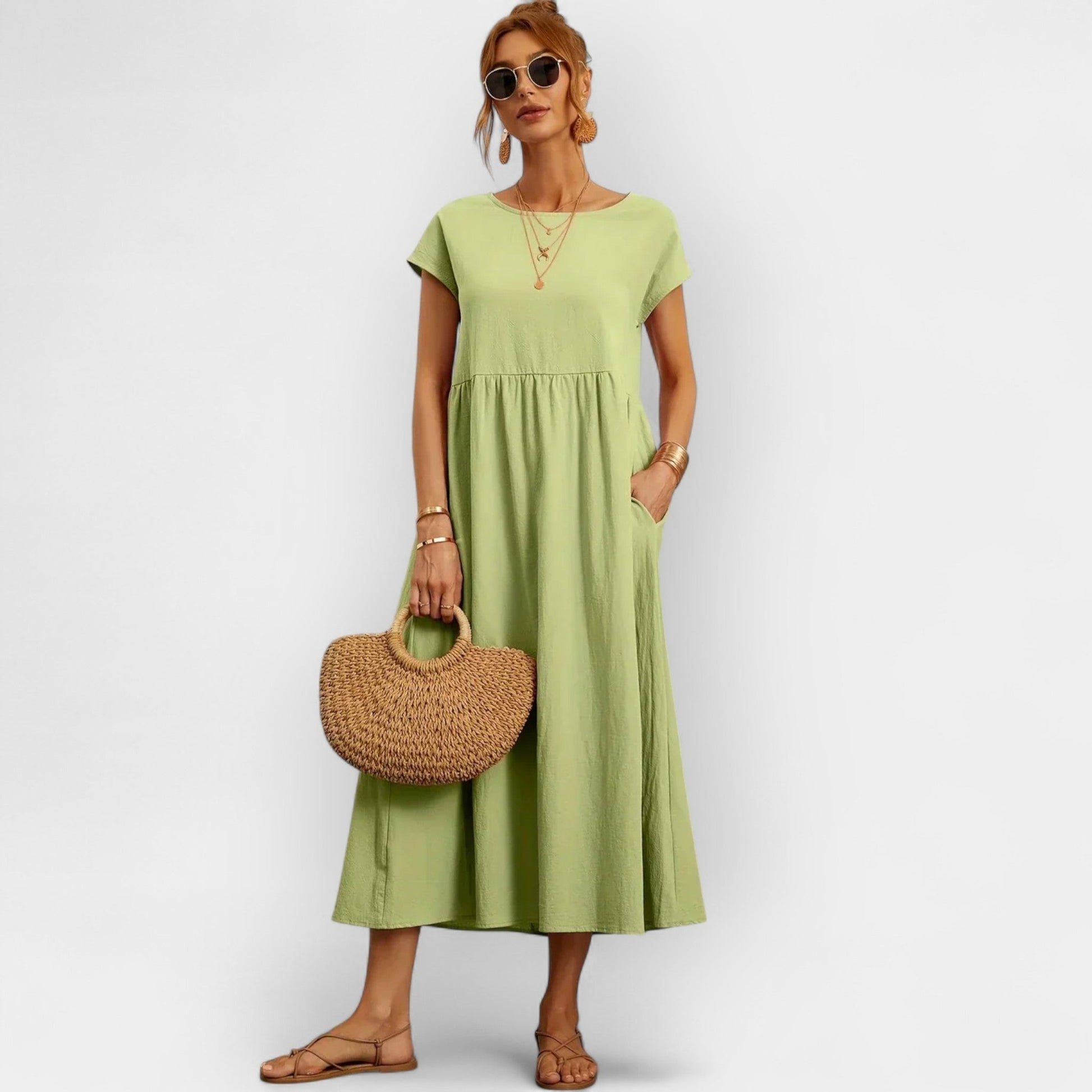 Damska sukienka midi z krótkim rękawem i kieszeniami bocznymi-Midi Dress-Olave