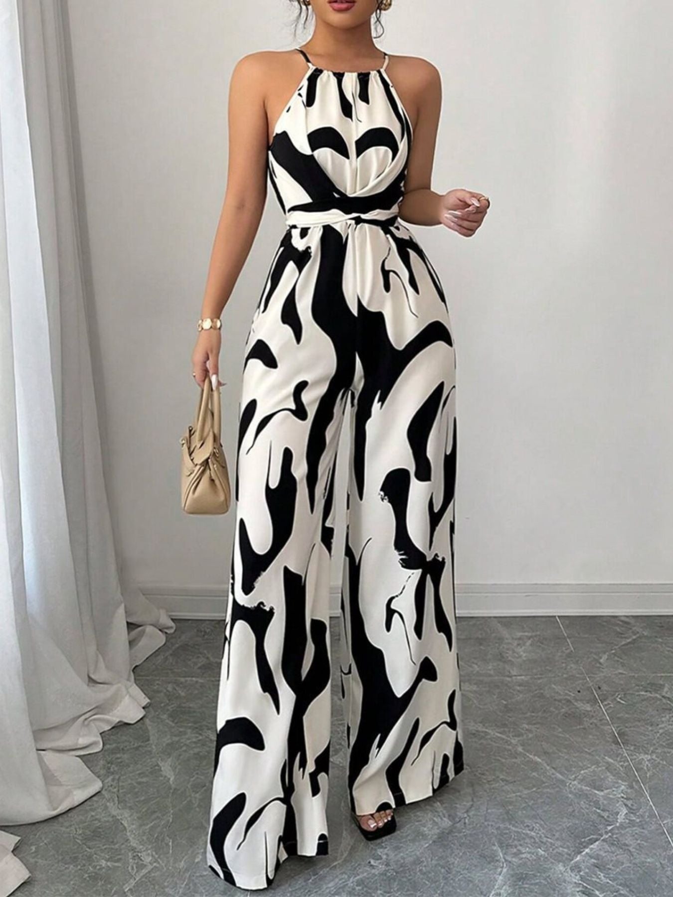 Damski kombinezon z dekoltem typu halter i szerokimi nogawkami w abstrakcyjny wzór-Jumpsuits for women-Olave
