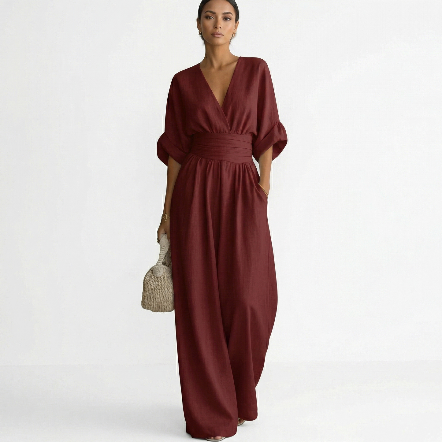 Damski kombinezon z dekoltem w serek i szerokimi nogawkami oraz paskiem w talii-Jumpsuits for women-Olave