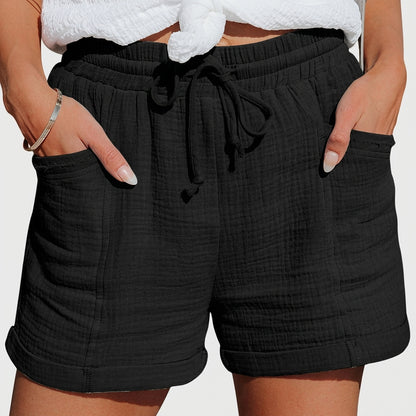 Damskie krótkie spodenki z elastycznym pasem i sznurkiem oraz naszywanymi kieszeniami i wywiniętymi nogawkami-Shorts for women-Olave