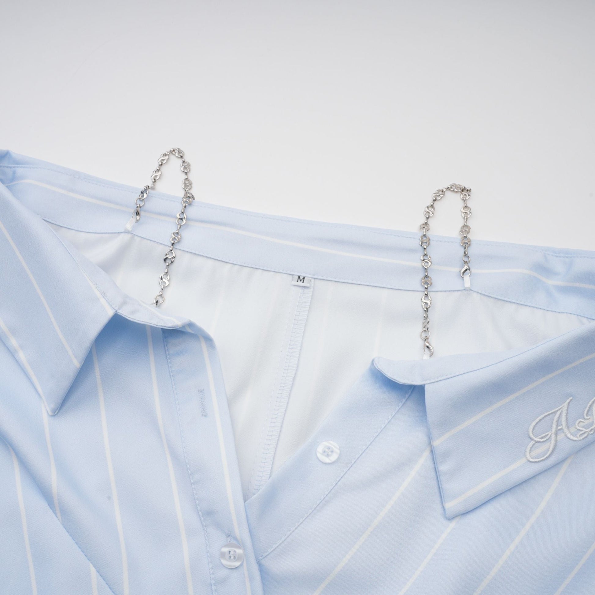 Damska bluzka w paski z odkrytymi ramionami i łańcuszkami-Blouses for women-Olave