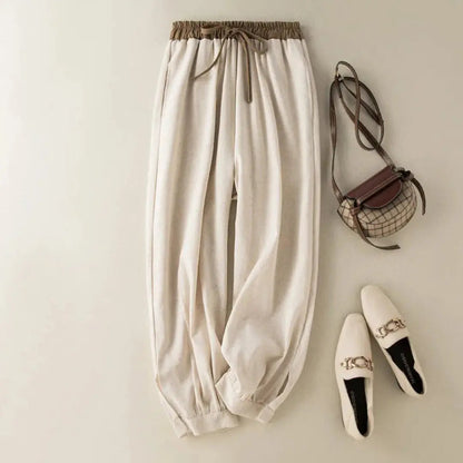 Damskie spodnie z elastycznym pasem, sznurkiem, zwężaną nogawką i ściągaczem-Pants for Women-Olave